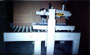 carton sealing machine with side drive