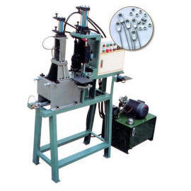 VERTICAL CABLE END INJECTION MOULDING MACHINE (CABLE VERTICAL FIN D`INJECTION MOULDING MACHINE)