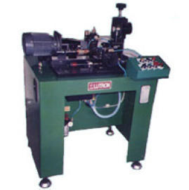 COMMUTATOR TURNING MACHINE (COLLECTEUR TURNING MACHINE)