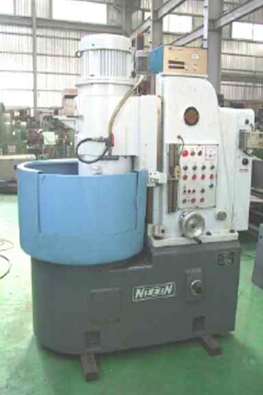 Rotary grinding machine (Rotary machine à meuler)