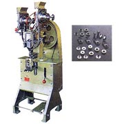 AUTOMATIC BUTTON-EYE FASTENING MACHINE (AUTOMATIC BUTTON-EYE FASTENING MACHINE)