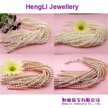  Rice-Shaped and Flat Freshwater Pearl String (Rice-Shaped et Flat perle d`eau douce String)