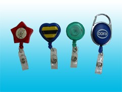 Retractable badge reels