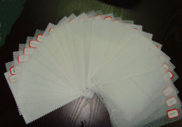 Nonwoven fusible interlining