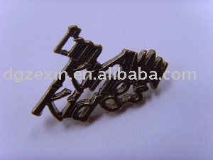 Stannum alloy badge