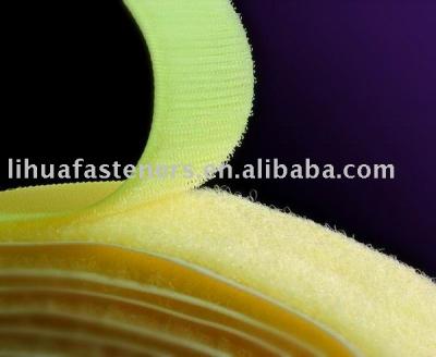 sewn-on fastening tape (cross country) (cousue sur la bande de fixation (cross country))
