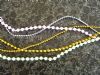 plastic beads trimming (perles de plastique parage)