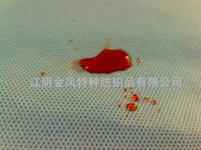 blood repellent nonwoven fabric